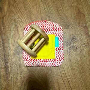 Lovevery crinkle bag and bell rattle